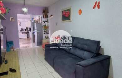 Imagem: A casa possui 2 Dormitórios, 1 Banheiro, 2 Vagas na garagem