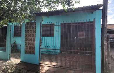 Imagem: A casa à venda possui 3 Dormitórios, 1 Banheiro e 1 Vaga na