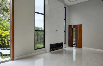 Imagem: A casa possui 3 Dormitórios, 3 Banheiros, 3 Vagas na garagem