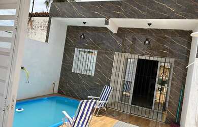 Imagem: A casa possui 2 Dormitórios, 2 Banheiros, 1 Vaga na garagem