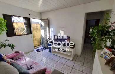 Imagem: A casa possui 5 Dormitórios, 3 Banheiros, 2 Vagas na garagem