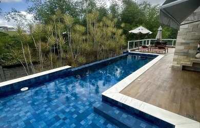 Imagem: A casa em condomínio possui 4 Dormitórios, 5 Banheiros, 4