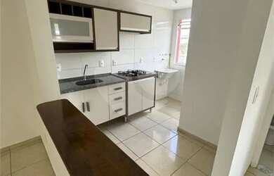 Imagem: O apartamento possui 2 Dormitórios, 1 Banheiro, 1 Vaga na garagem