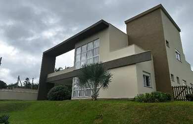 Imagem: A casa em condomínio possui 3 Dormitórios, 5 Banheiros, 4