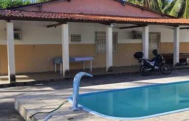 Imagem: A casa possui 3 Dormitórios, 4 Vagas na garagem e está localizado