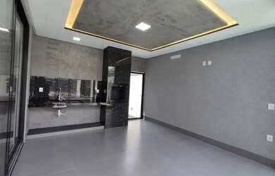 Imagem: A casa possui 3 Dormitórios, 4 Banheiros e 4 Vagas na garagem