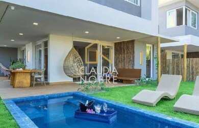 Imagem: A casa possui 4 Dormitórios, 4 Banheiros, 1 Vaga na garagem