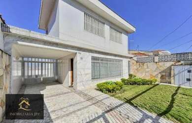 Imagem: A casa possui 4 Dormitórios, 4 Banheiros, 5 Vagas na garagem