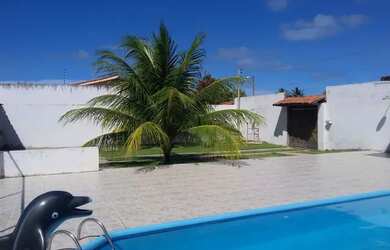 Imagem: A casa possui 3 Dormitórios, 5 Vagas na garagem e está localizado