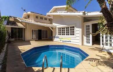 Imagem: A casa em condomínio possui 4 Dormitórios, 5 Banheiros, 4