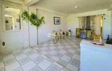 Imagem: A casa possui 3 Dormitórios, 2 Banheiros, 1 Vaga na garagem