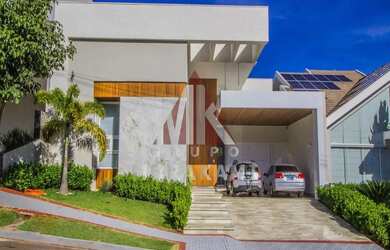 Imagem: A casa em condomínio possui 4 Dormitórios, 5 Banheiros, 2