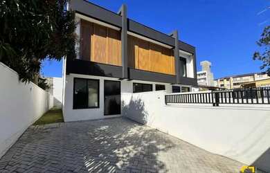 Imagem: A casa à venda possui 3 Dormitórios, 3 Banheiros, 2 Vagas