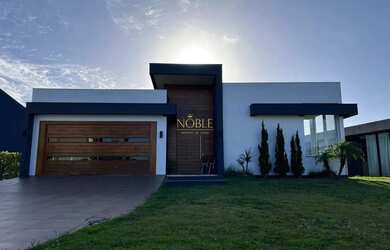 Imagem: A casa em condomínio possui 3 Dormitórios, 4 Banheiros, 4