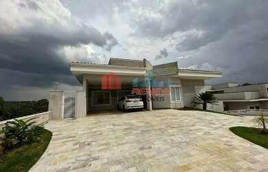 Imagem: A casa possui 4 Dormitórios, 5 Banheiros, 5 Vagas na garagem