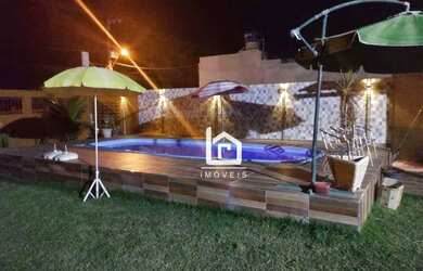 Imagem: A casa em condomínio possui 5 Dormitórios, 4 Banheiros, 600m²