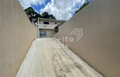 Imagem: A casa possui 2 Dormitórios, 2 Banheiros, 3 Vagas na garagem