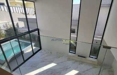 Imagem: A casa em condomínio possui 4 Dormitórios, 5 Banheiros, 4