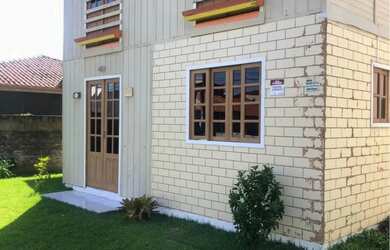 Imagem: A casa possui 3 Dormitórios, 2 Banheiros, 100m² de Área e