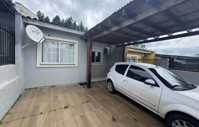 Imagem: A casa à venda possui 2 Dormitórios, 1 Banheiro e 1 Vaga na