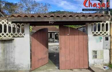 Imagem: A casa possui 2 Dormitórios, 2 Banheiros, 4 Vagas na garagem