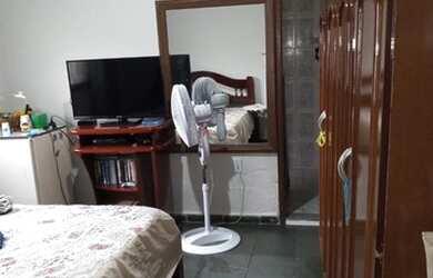 Imagem: A casa possui 4 Dormitórios, 4 Banheiros, 1 Vaga na garagem