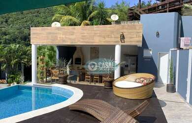 Imagem: A casa em condomínio possui 4 Dormitórios, 4 Banheiros, 4