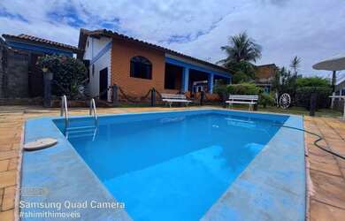 Imagem: A casa possui 4 Dormitórios, 5 Banheiros, 5 Vagas na garagem