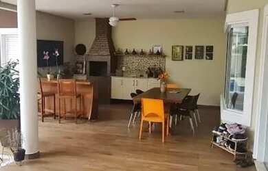 Imagem: A casa em condomínio possui 5 Dormitórios, 5 Banheiros, 3