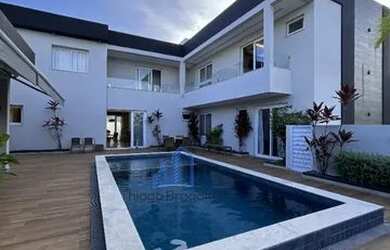 Imagem: A casa em condomínio possui 5 Dormitórios, 5 Banheiros, 5