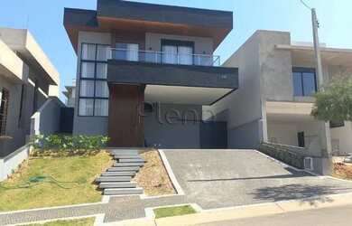 Imagem: A casa em condomínio possui 4 Dormitórios, 5 Banheiros, 4