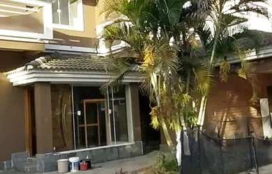 Imagem: A casa em condomínio possui 4 Dormitórios, 4 Banheiros, 3