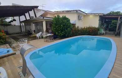 Imagem: A casa possui 3 Dormitórios, 3 Banheiros, 4 Vagas na garagem