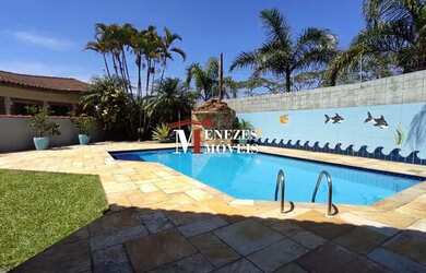 Imagem: A casa em condomínio possui 4 Dormitórios, 5 Banheiros, 4