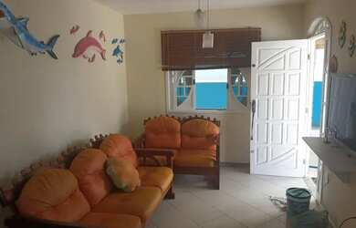 Imagem: A casa possui 3 Dormitórios, 2 Banheiros, 3 Vagas na garagem