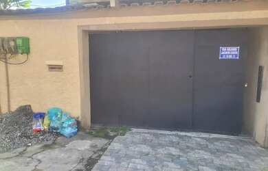 Imagem: A casa possui 2 Dormitórios, 1 Banheiro, 1 Vaga na garagem