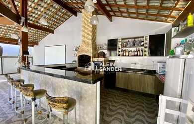 Imagem: A casa possui 3 Dormitórios, 5 Banheiros, 5 Vagas na garagem