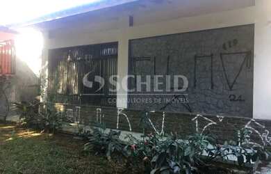 Imagem: A casa possui 5 Dormitórios, 5 Banheiros, 4 Vagas na garagem