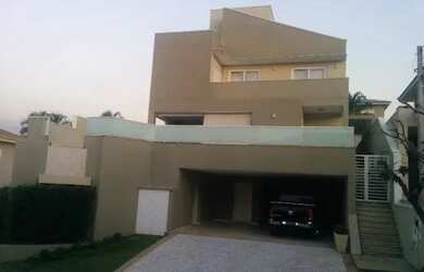 Imagem: A casa em condomínio possui 4 Dormitórios, 4 Banheiros, 4