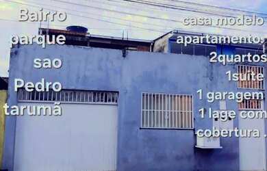 Imagem: A casa possui 2 Dormitórios, 3 Vagas na garagem e está localizado