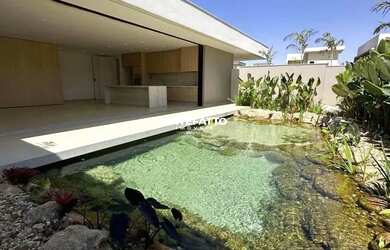 Imagem: A casa possui 3 Dormitórios, 4 Banheiros, 3 Vagas na garagem