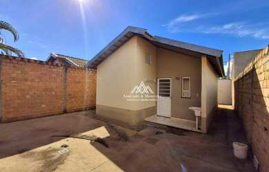 Imagem: A casa possui 2 Dormitórios, 1 Banheiro, 2 Vagas na garagem