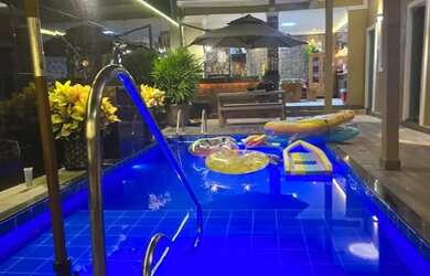 Imagem: A casa em condomínio possui 4 Dormitórios, 5 Banheiros, 2