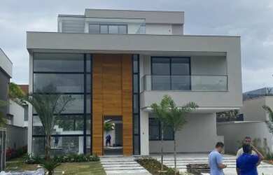 Imagem: A casa em condomínio possui 4 Dormitórios, 5 Banheiros, 5