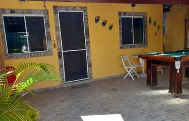 Imagem: A casa possui 2 Dormitórios, 2 Banheiros, 1 Vaga na garagem