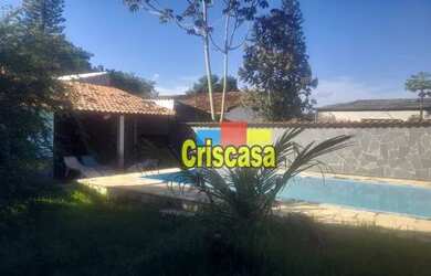 Imagem: A casa possui 3 Dormitórios, 3 Banheiros, 3 Vagas na garagem