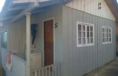 Imagem: A casa possui 2 Dormitórios, 1 Banheiro e está localizado