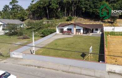 Imagem: A casa possui 2 Dormitórios, 3 Banheiros, 1 Vaga na garagem