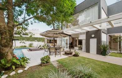 Imagem: A casa em condomínio possui 4 Dormitórios, 5 Banheiros, 5