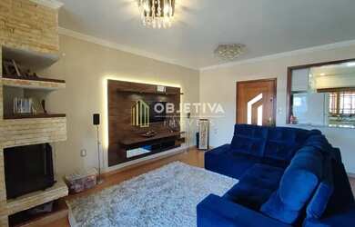 Imagem: A casa possui 4 Dormitórios, 5 Banheiros, 3 Vagas na garagem